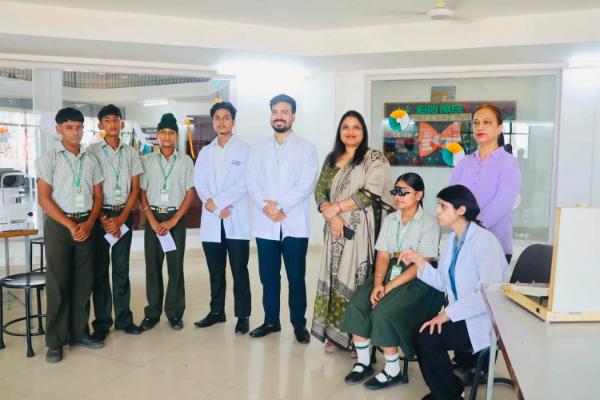 Students undergoing free eye screening at Apex International